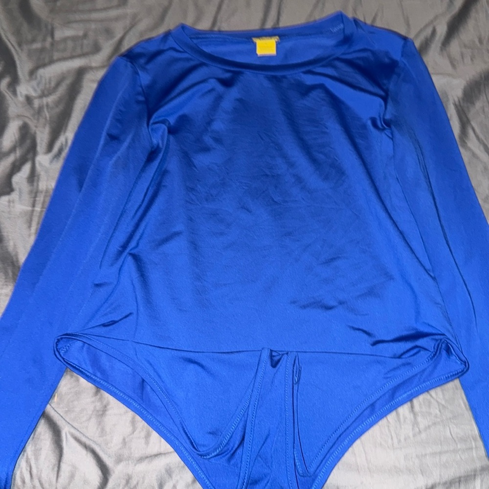 Long sleeve blue body suit
Size 1x